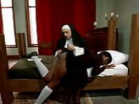 Bound lesbian ebony spanked by nun